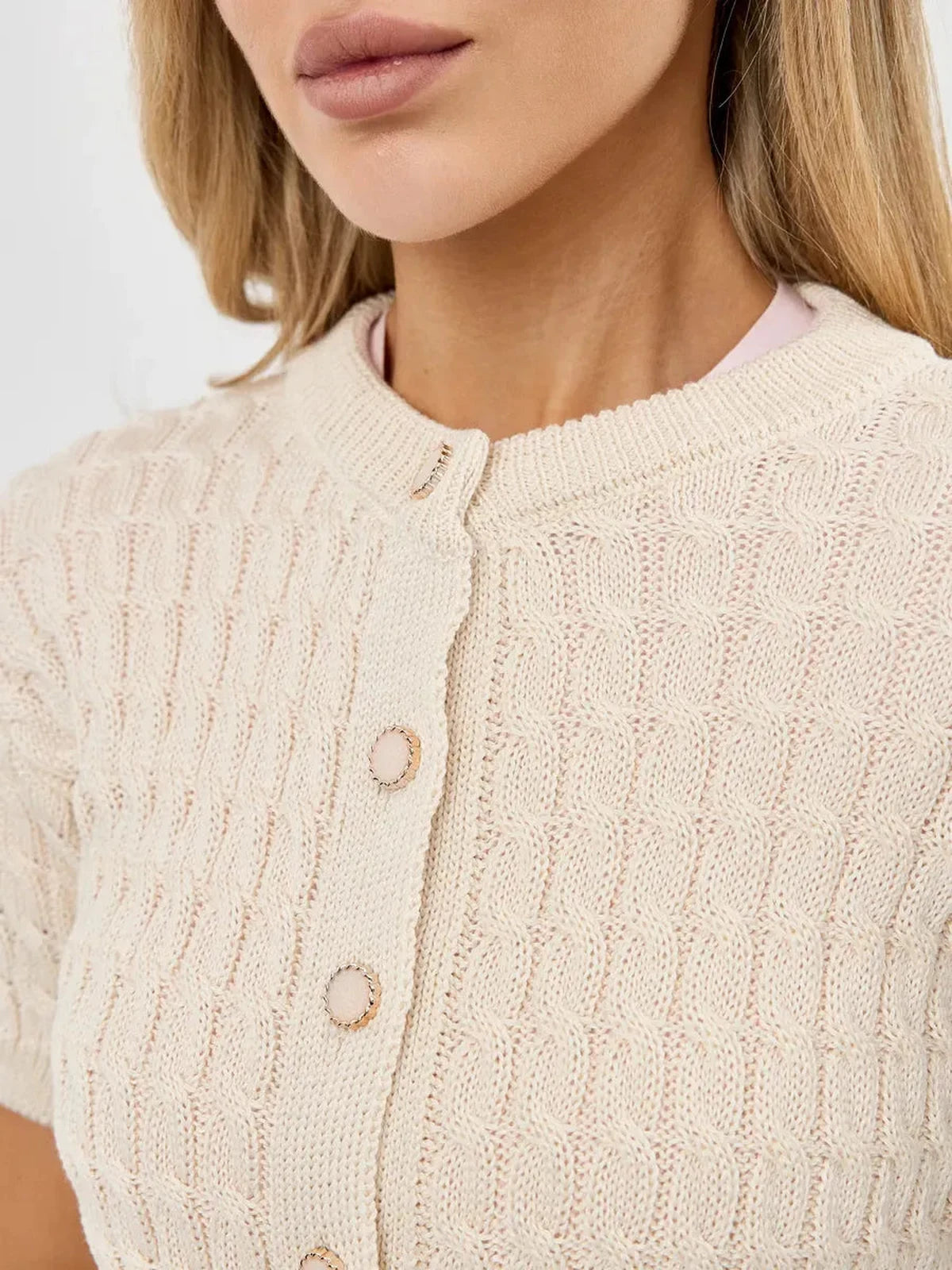 Lumiere Cardigan by Lauven – Close-up of lightweight cotton-acrylic knitwear showcasing buttons and textured fabric.