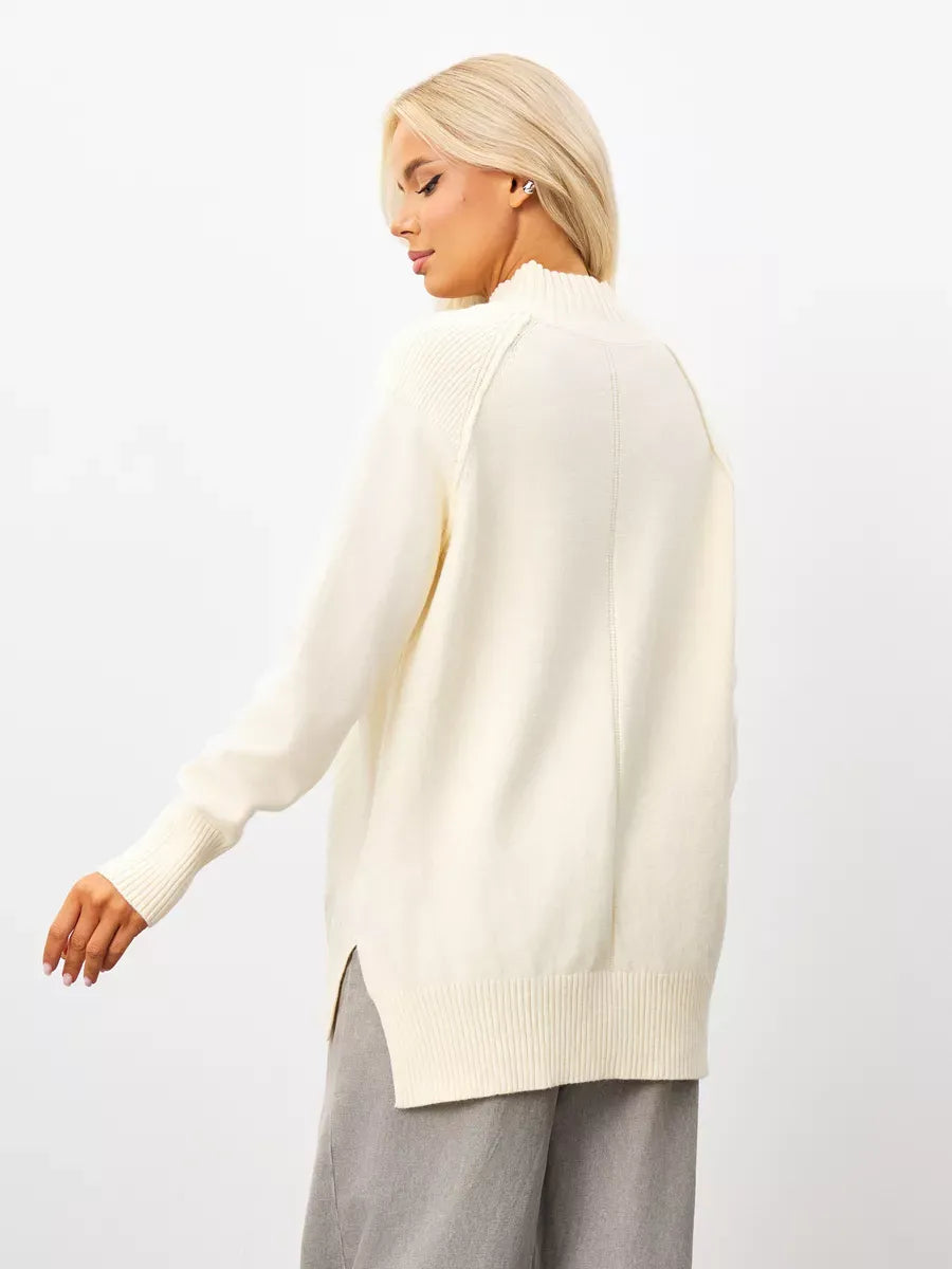 Liora Sweater by Lauven, oversized milk white cashmere knitwear with high neck, back view showing elegant design.