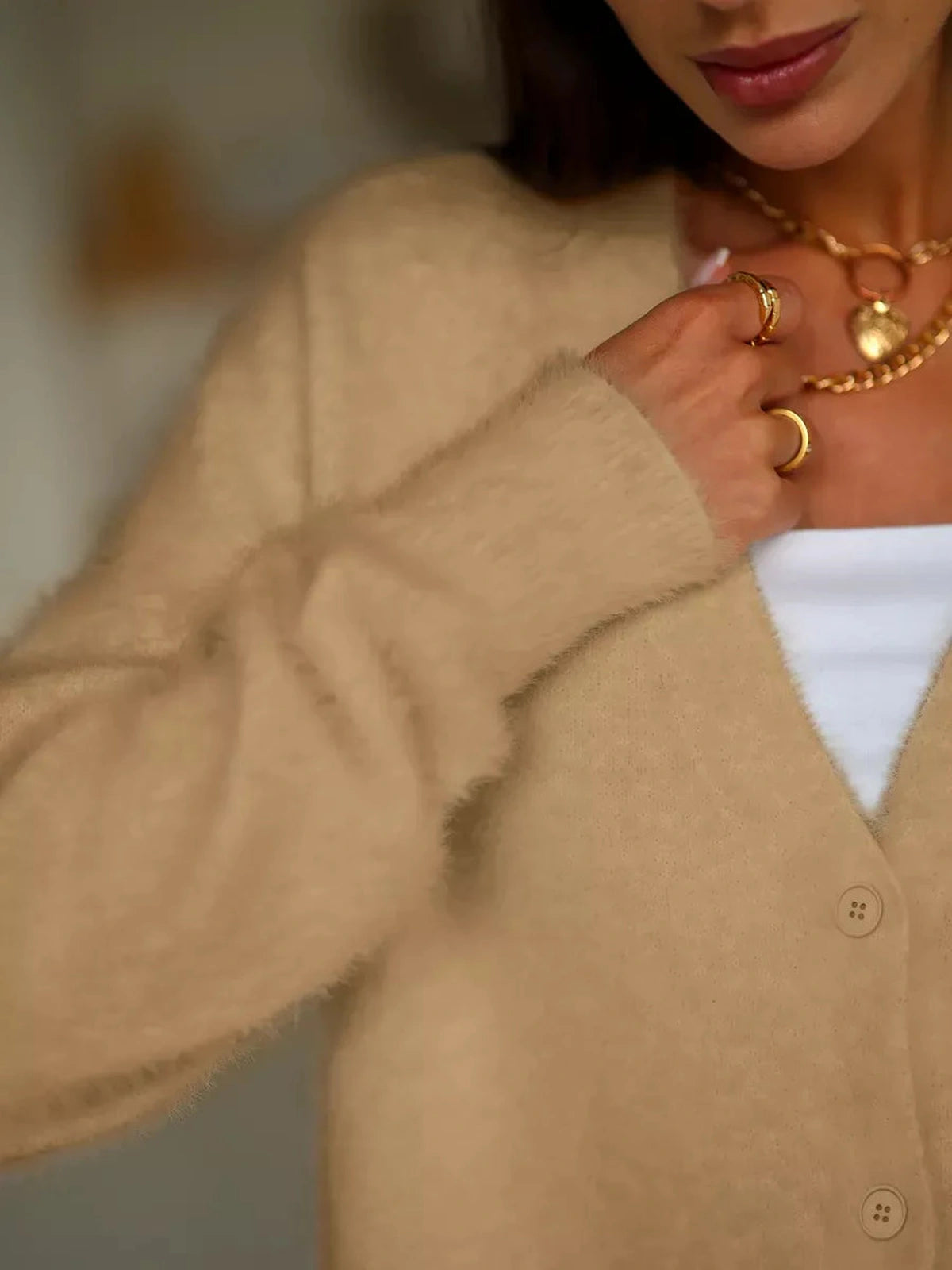 Camelia Cardigan by Lauven, plush oversized knitwear with button closure, showcasing a beige tone for stylish comfort.