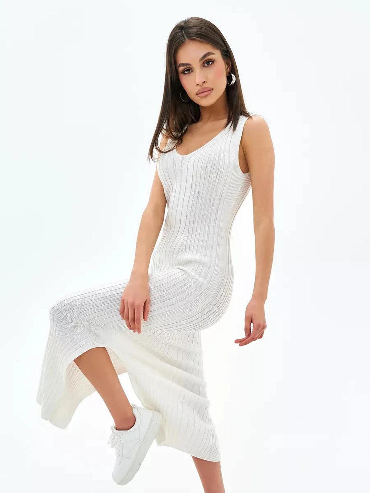 Aria Midi Dress by Lauven, showcasing ivory ribbed knit design with sleeveless style and V-neckline.
