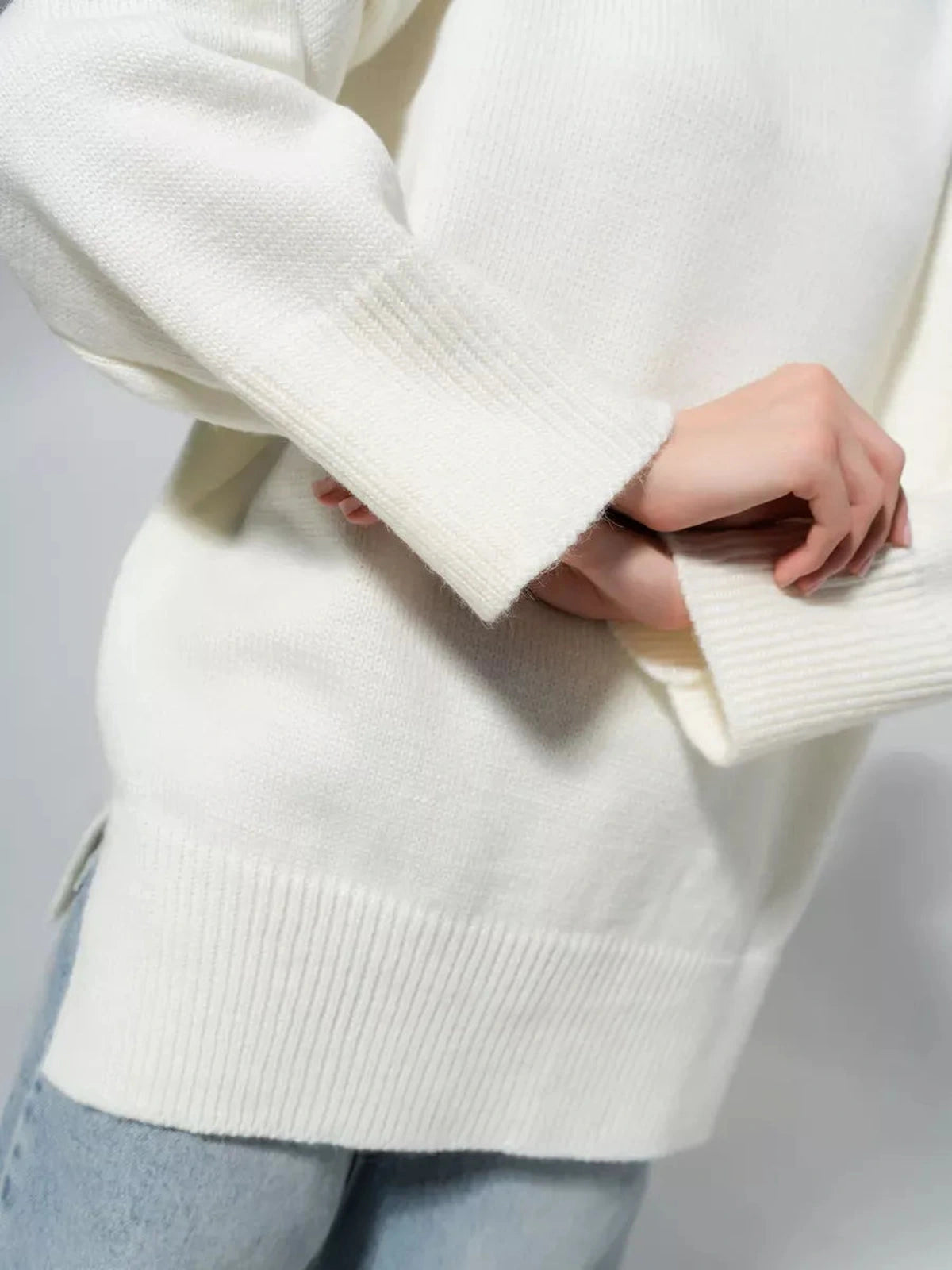 Lauven Luna Sweater close-up showing oversized knit in soft milk white, perfect for layering in winter.