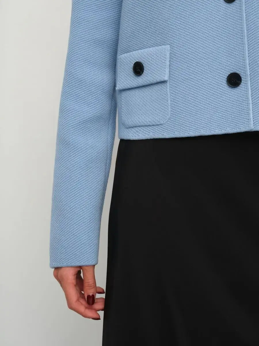 Lazio Jacket by Lauven, cropped light blue women's jacket with button closure and pocket detail.