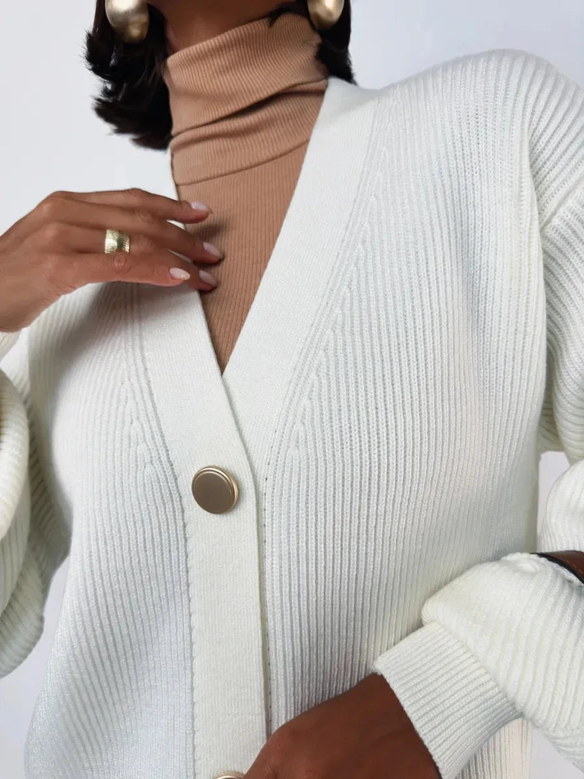 Ivorya Cardigan by Lauven, showcasing longline oversized knit in elegant cream with stylish buttons.