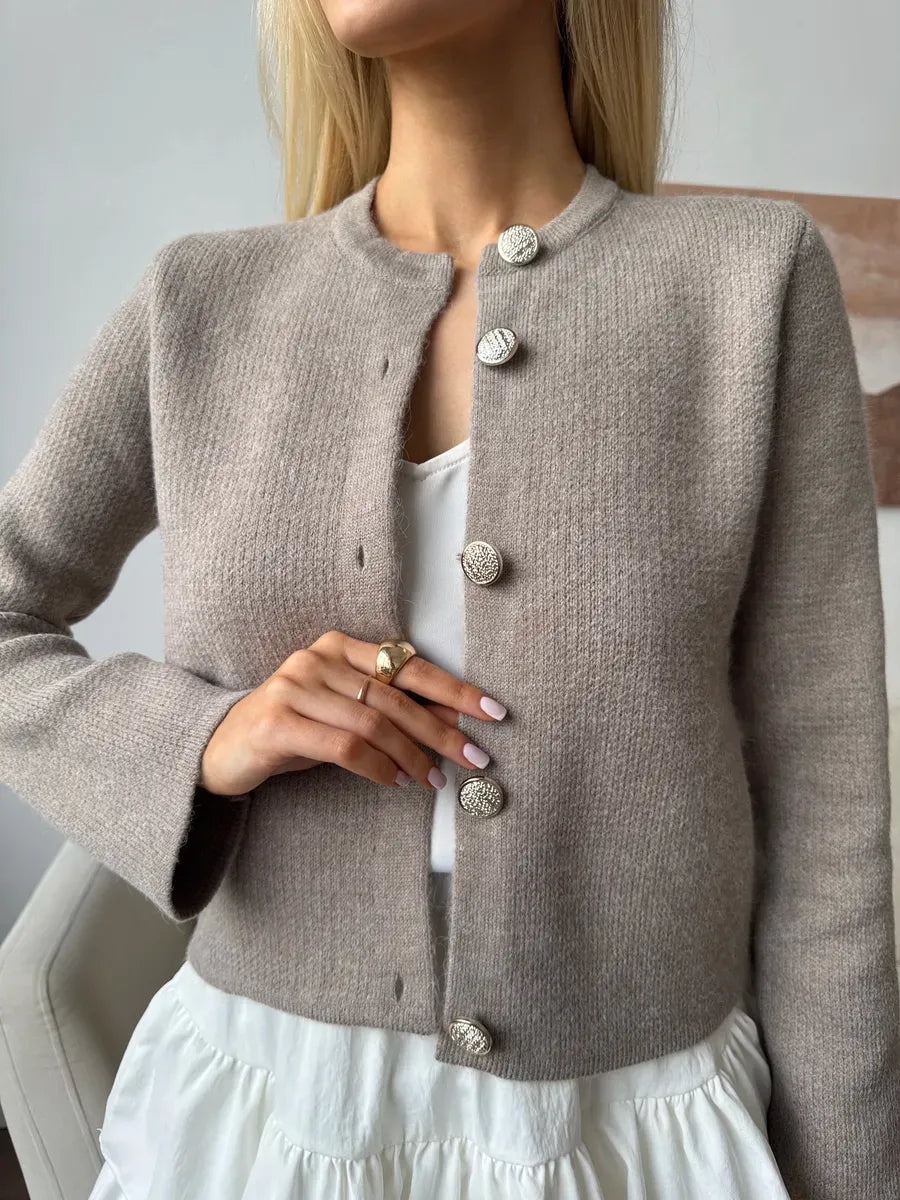 Aveline Cardigan by Lauven, soft cappuccino cropped knitwear with decorative buttons, perfect for layering.