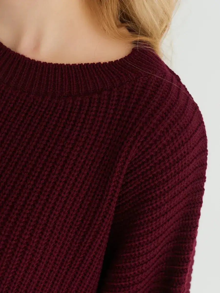 Close-up of the Bordeaux Sweater by Lauven, showcasing its soft ribbed knit in deep burgundy.