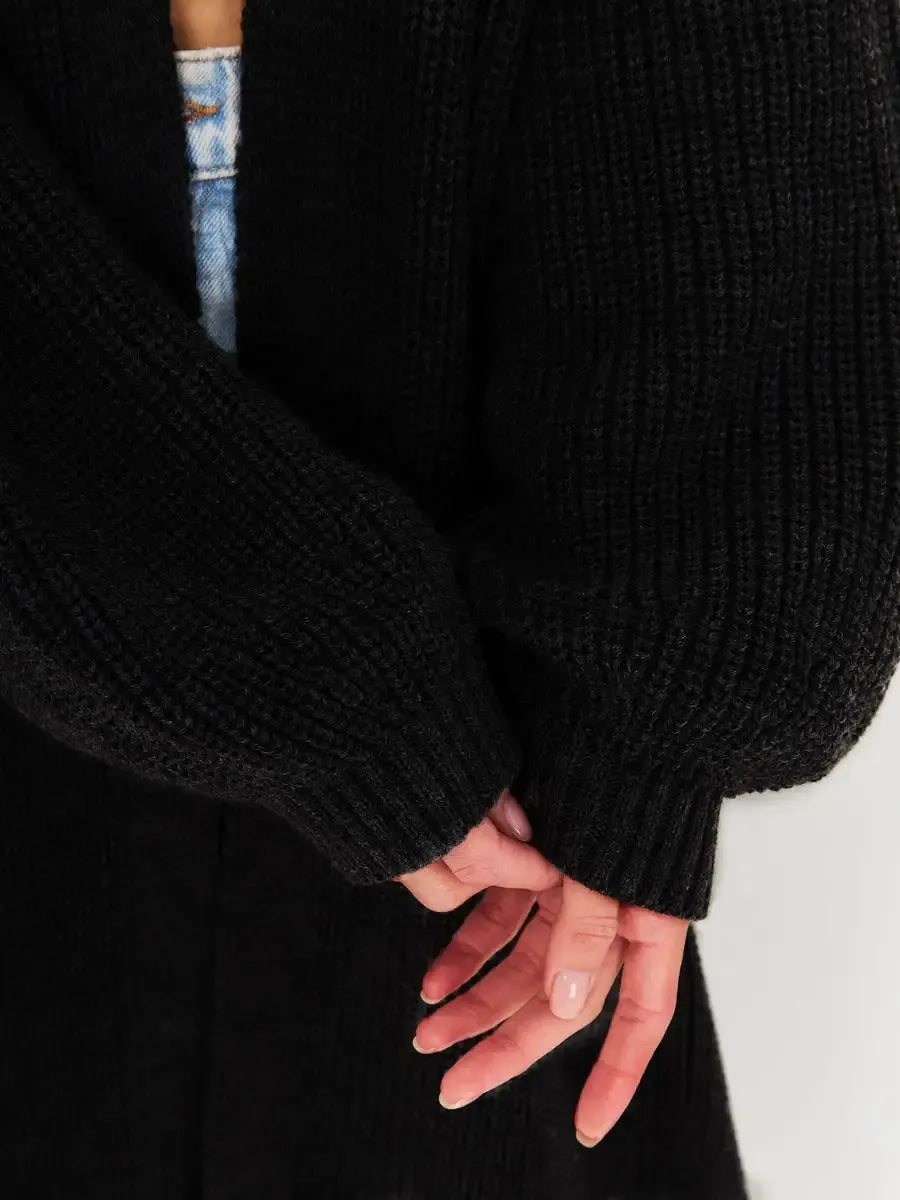 Onyx Cardigan by Lauven, showcasing cozy oversized chunky knitwear with detailed sleeves.