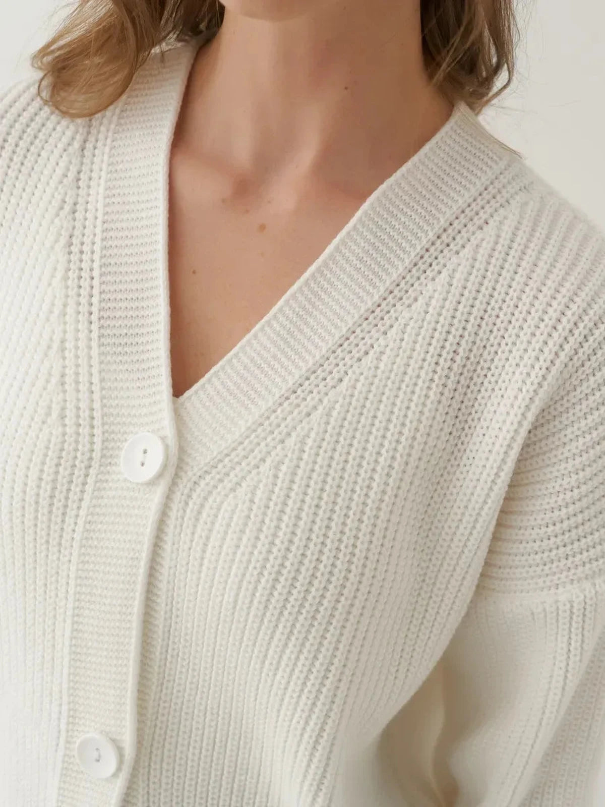 Lauven Pearl Cardigan - Chic oversized button-front knitwear in white featuring a cozy texture.