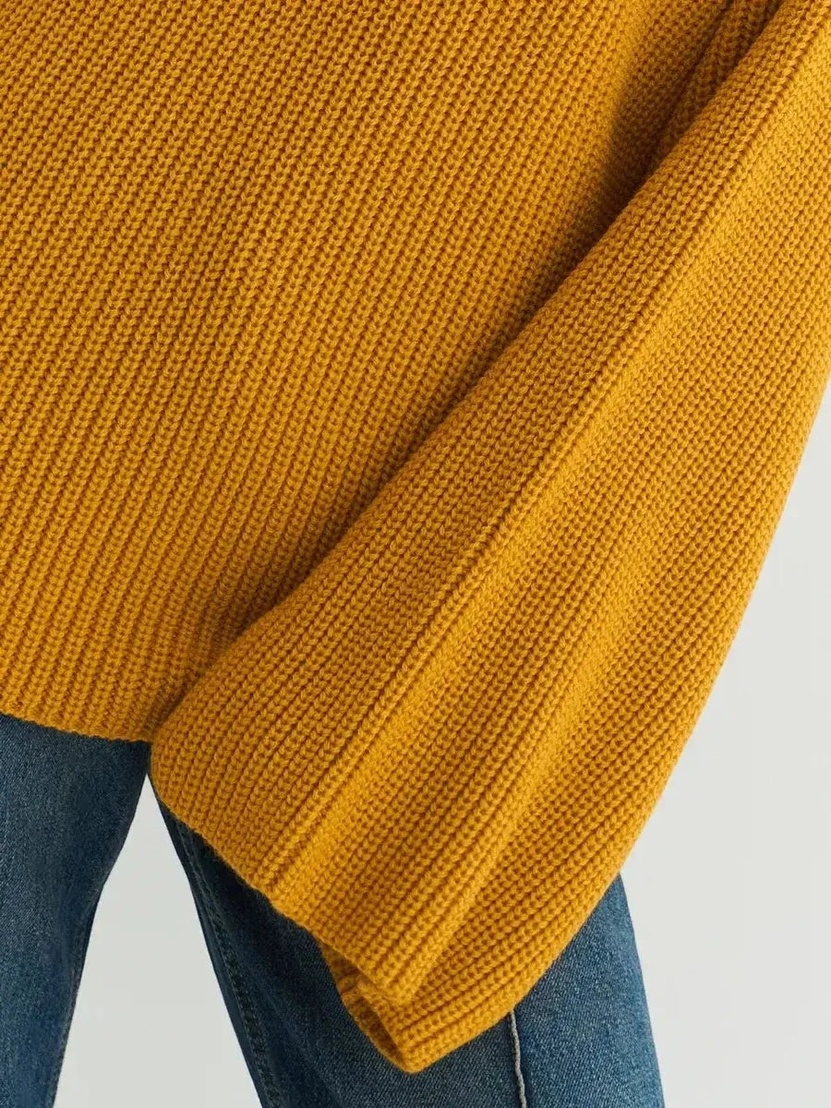 Solara Sweater by Lauven, oversized knit in vibrant mustard yellow with ribbed texture and cozy fit.