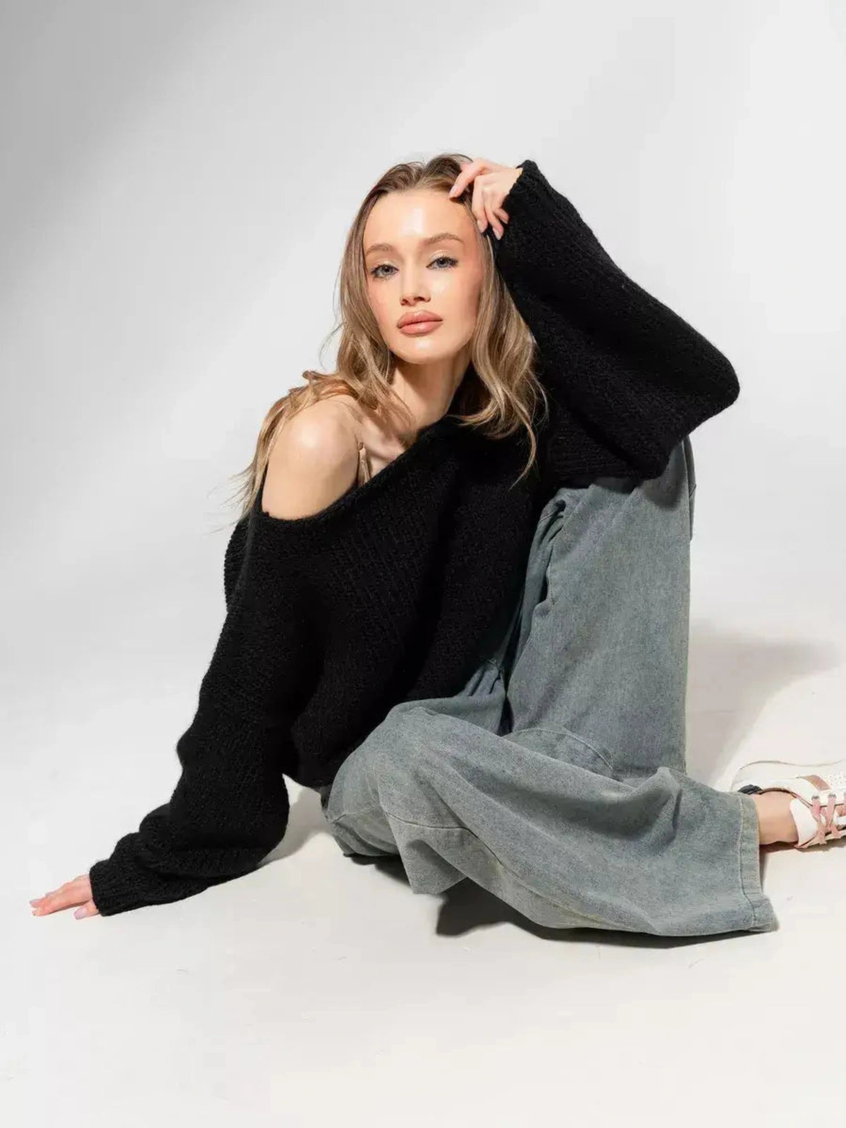 Noir Sweater by Lauven, oversized off-shoulder knit in classic black, blending comfort and sophistication.