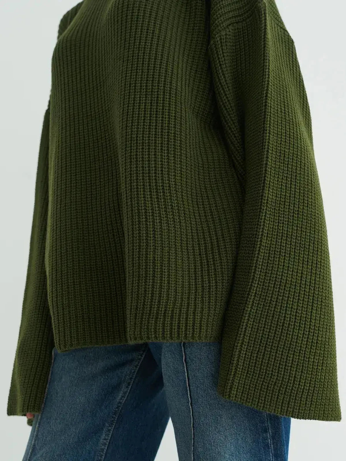 Olive Sweater by Lauven, showcasing an oversized knit design in deep khaki with a ribbed texture.