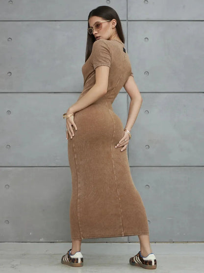 Stylish model showcasing the Sculpted Ease Maxi Dress in washed tobacco, highlighting its flattering fit and sleek design.