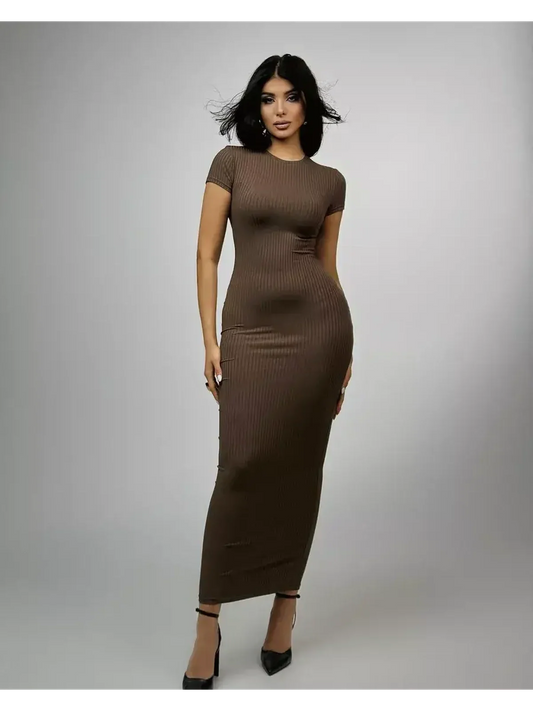 Chocolate-hued maxi dress with ribbed texture and sleek silhouette, perfect for elegant and minimalistic style.