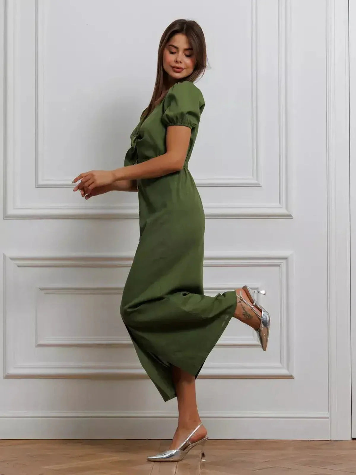 Olive Whisper Maxi Dress featuring puff sleeves and a tie front, showcasing natural elegance in khaki hue.