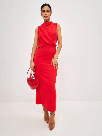 Elegant woman in a red drape maxi dress, featuring a stylish neckline and sleek silhouette, perfect for formal events.