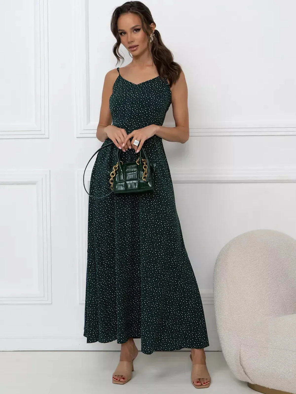 Emerald Whisper Maxi Dress featuring a back tie detail, A-line silhouette, and dotted print for elegant summer wear.