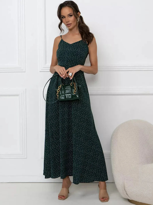 Emerald Whisper Maxi Dress featuring a back tie detail, A-line silhouette, and dotted print for elegant summer wear.