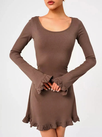 Mocha Flare ribbed knit mini dress with flared cuffs and ruffled hem, perfect for transitional styling.