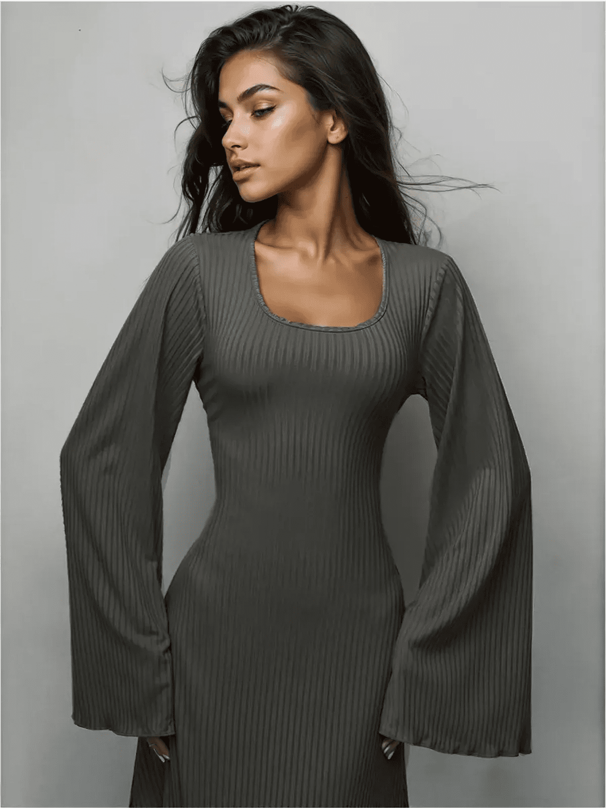 Granite Luxe Maxi Dress featuring a sculpted fit, flared sleeves, and ribbed texture, perfect for elegant styling.