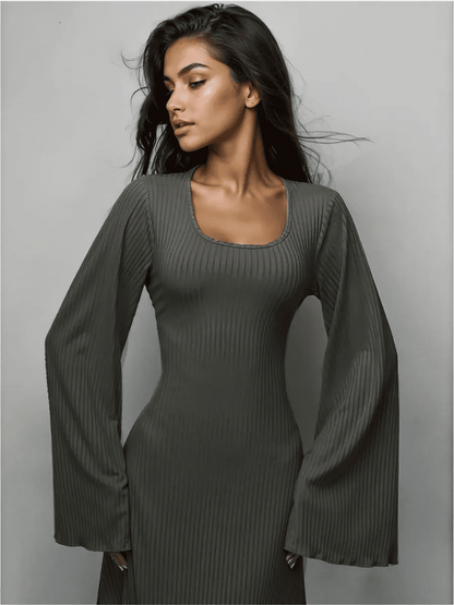 Granite Luxe Maxi Dress featuring a sculpted fit, flared sleeves, and ribbed texture, perfect for elegant styling.