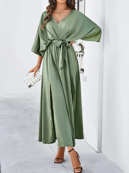 Elegant Serenity Maxi Dress in green with kimono sleeves, V-neckline, and adjustable waist tie for graceful movement.