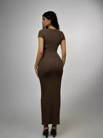 Back view of a chocolate-hued ribbed maxi dress showcasing a sleek, contouring silhouette.