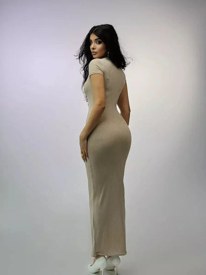 Woman wearing a ribbed beige Maxi Dress Contour Grace, showcasing elegant silhouette and minimalist design.