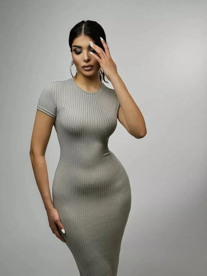 Sculpted Grace Maxi Dress in soft ribbed knit, showcasing a sleek, figure-hugging silhouette for everyday elegance.