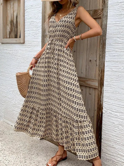 Solana Maxi Dress in boho print, showcasing a sleeveless design and tiered skirt, perfect for summer outings.