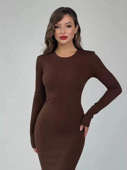 Sculpted Aura Maxi Dress in ribbed knit, featuring a crew neckline and elegant silhouette in rich brown.