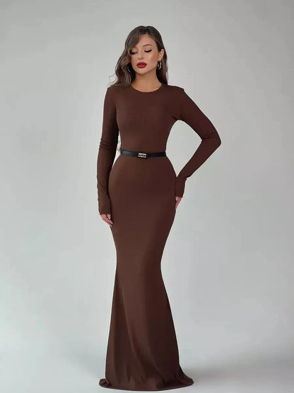Elegant Sculpted Aura Maxi Dress in brown, featuring a fitted silhouette and refined crew neckline.
