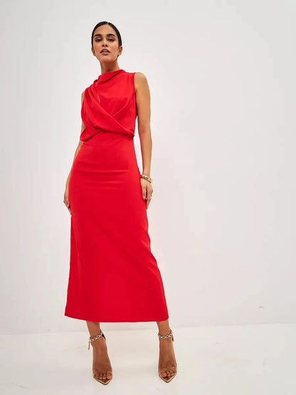 Model wearing a stunning Red Drape Maxi Dress showcasing an elegant, figure-skimming silhouette and artful neckline.