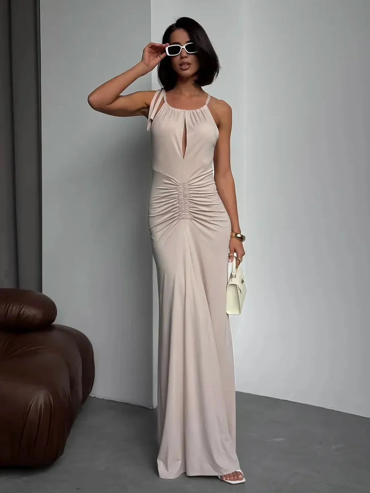 Elegant Serene Curve Maxi Dress with halter neckline and ruched detailing, perfect for summer occasions.