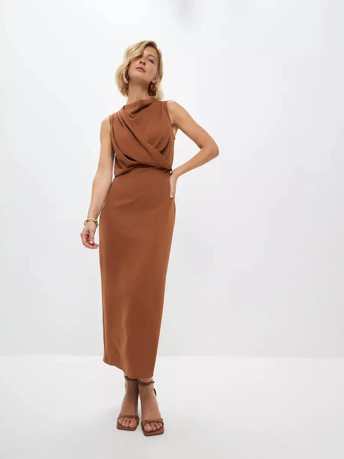 Sculpted Drape Maxi Dress in warm light brown, showcasing elegant fluid draping and a refined silhouette for formal occasions.