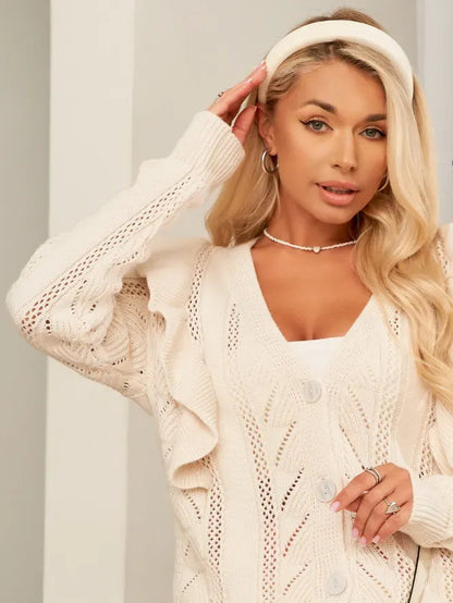 Amara Cardigan by Lauven - Long cream knit cardigan with ruffles and button closure, perfect for adding elegance.