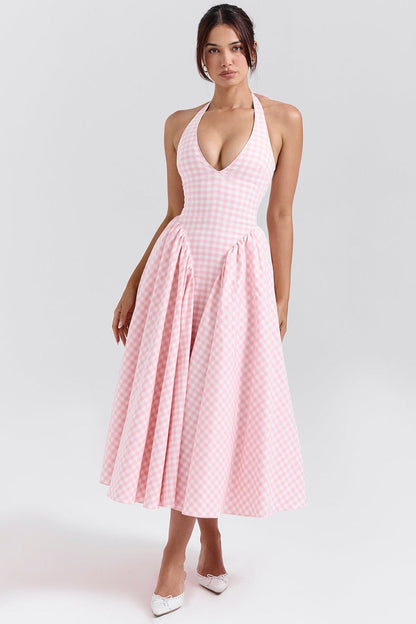 Pink gingham maxi dress with halter neckline, perfect for summer parties and weddings.