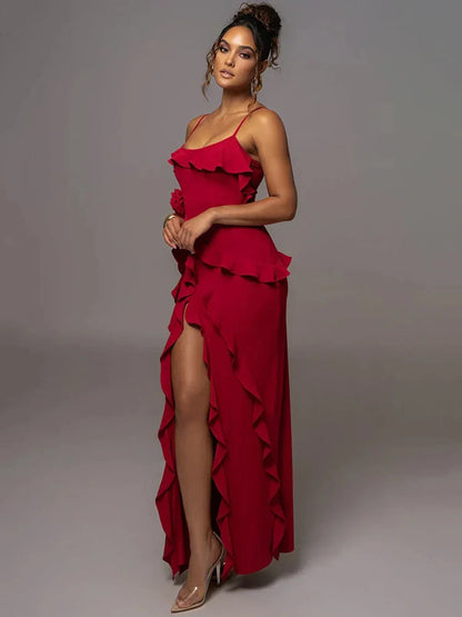 Elegant red Aurora Maxi Dress with cascading ruffles and thigh-high slit, perfect for special occasions.