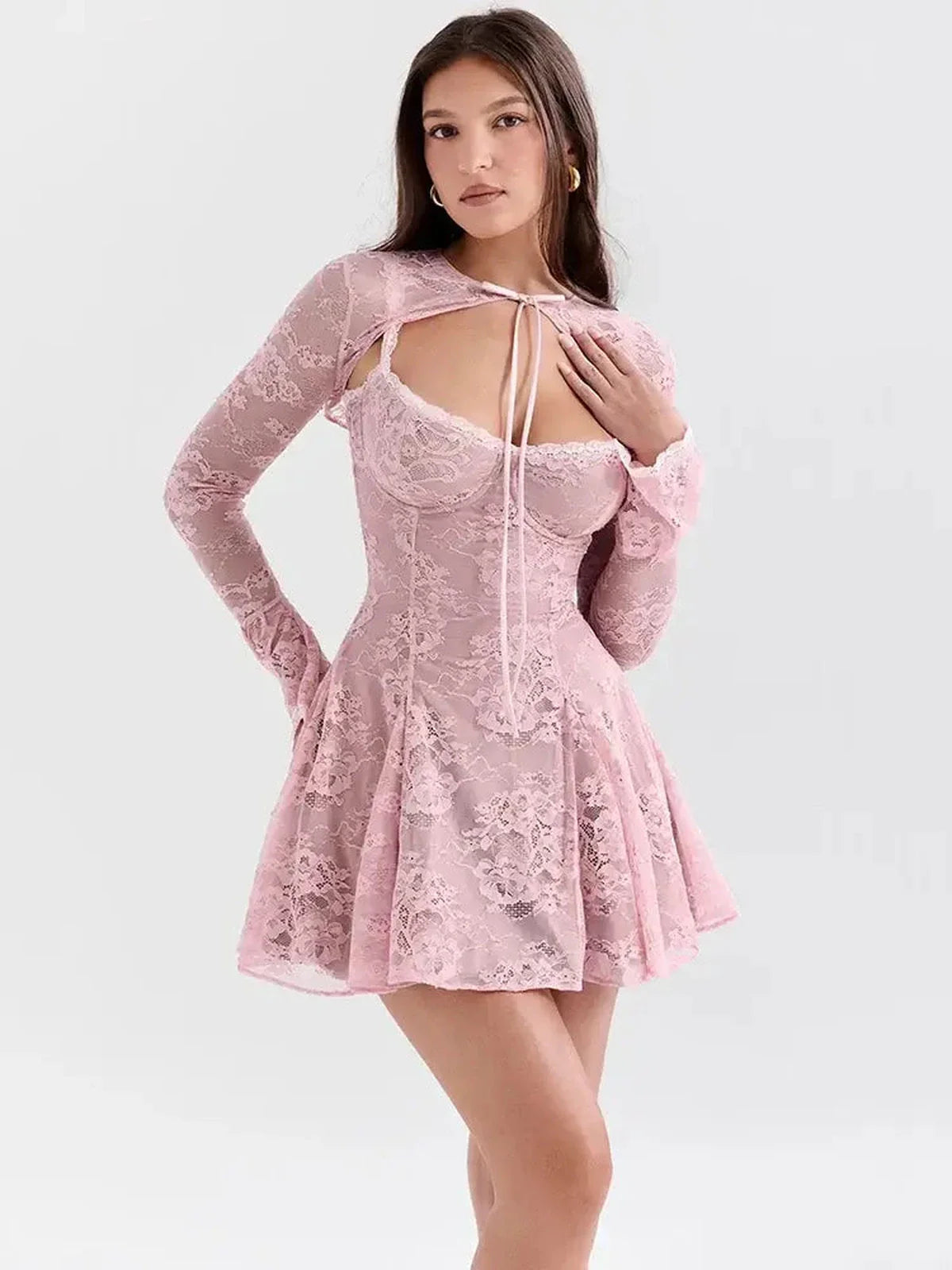 Adele Mini Dress: Elegant pink lace mini dress with long sleeves and cutout neckline, perfect for weddings and special occasions.