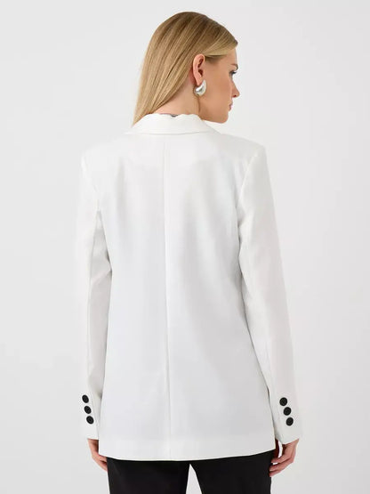 Alabaster Blazer by Lauven - Back view of oversized double-breasted white tailored jacket for women.