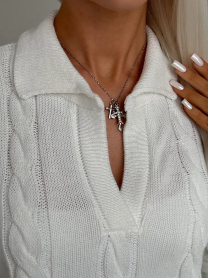 Alabaster Sweater by Lauven featuring a stylish V-neck and cable knit design, perfect for fall and winter fashion.