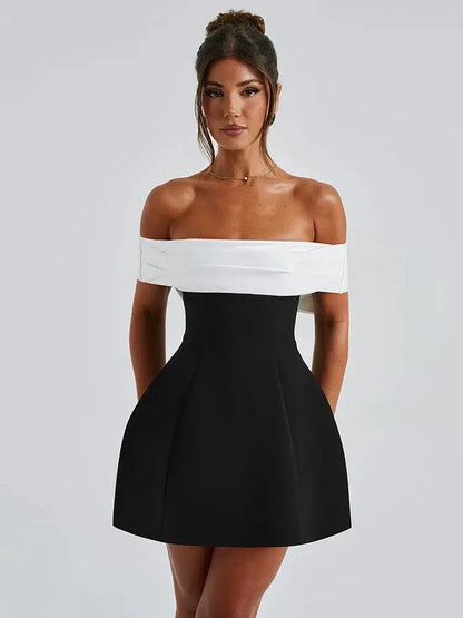 Elegant off-shoulder Alba Mini Dress featuring a structured A-line silhouette and oversized bow, perfect for summer and formal events.