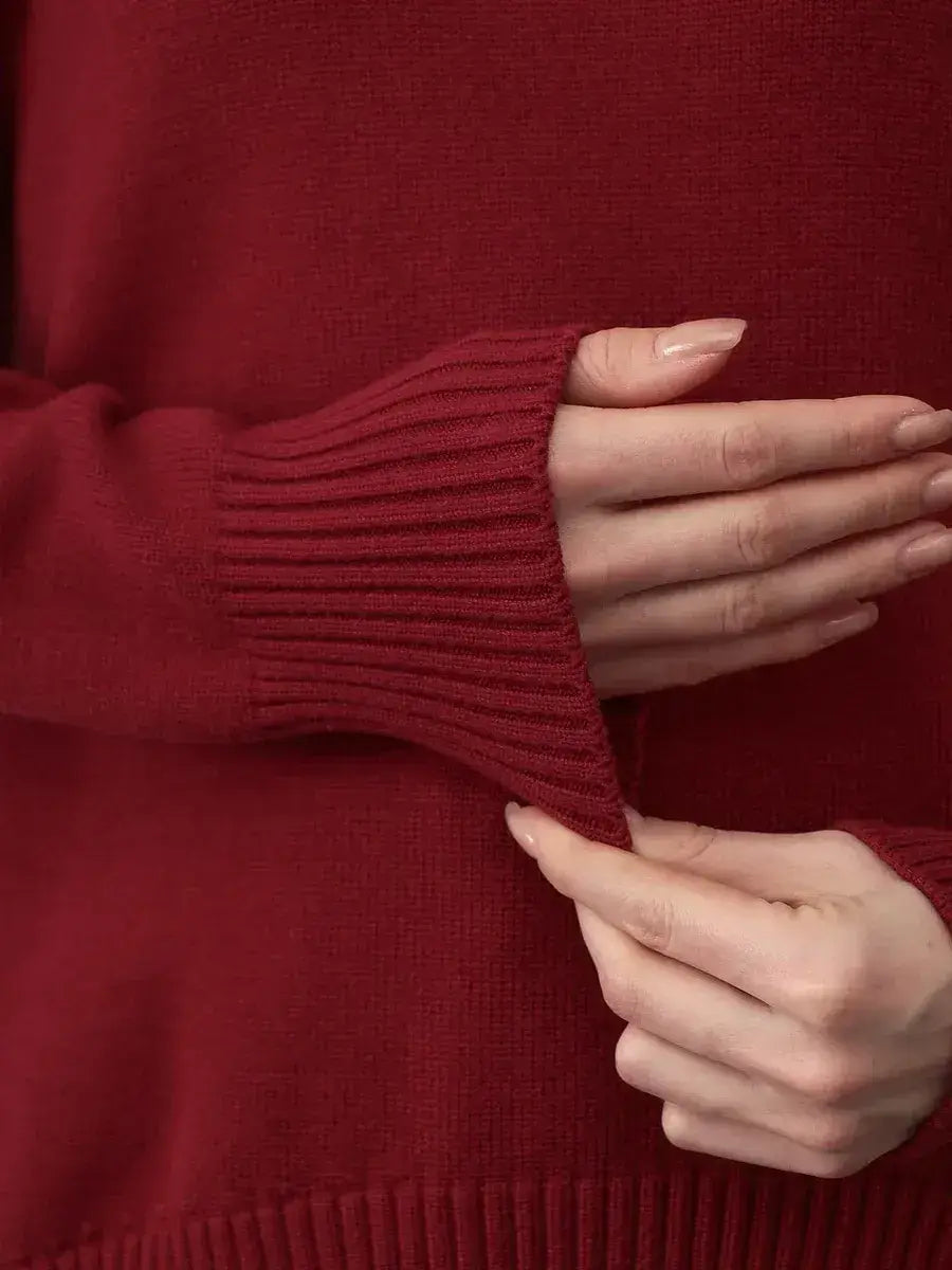 Arden Sweater by Lauven, burgundy turtleneck knitwear showcasing ribbed cuffs and luxurious softness.