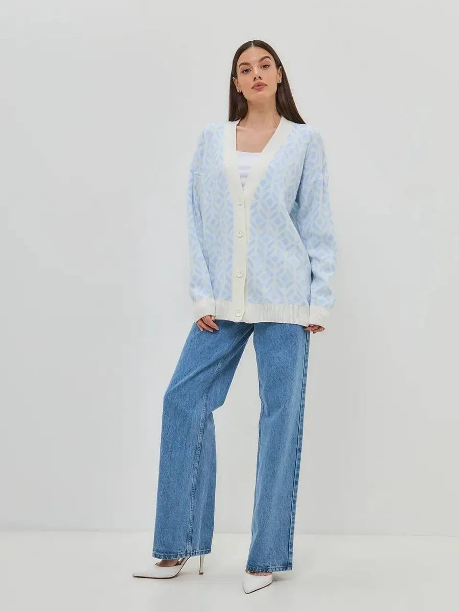 Arika Cardigan by Lauven featuring lightweight longline acrylic knitwear in milk blue on a model