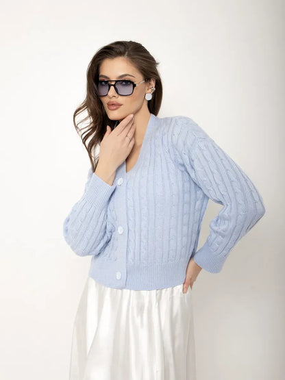 Aurelia Cardigan by Lauven — Cropped light blue knit cardigan with button closure, showcasing effortless elegance.
