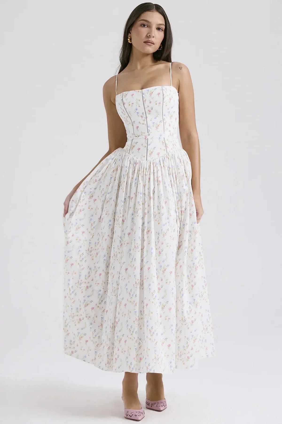 Aurora Maxi Dress featuring floral patterns, elegant design, perfect for summer events and special occasions.