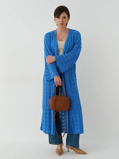 Azure Cardigan by Lauven, lightweight openwork summer cardigan in dark blue worn with a casual outfit.