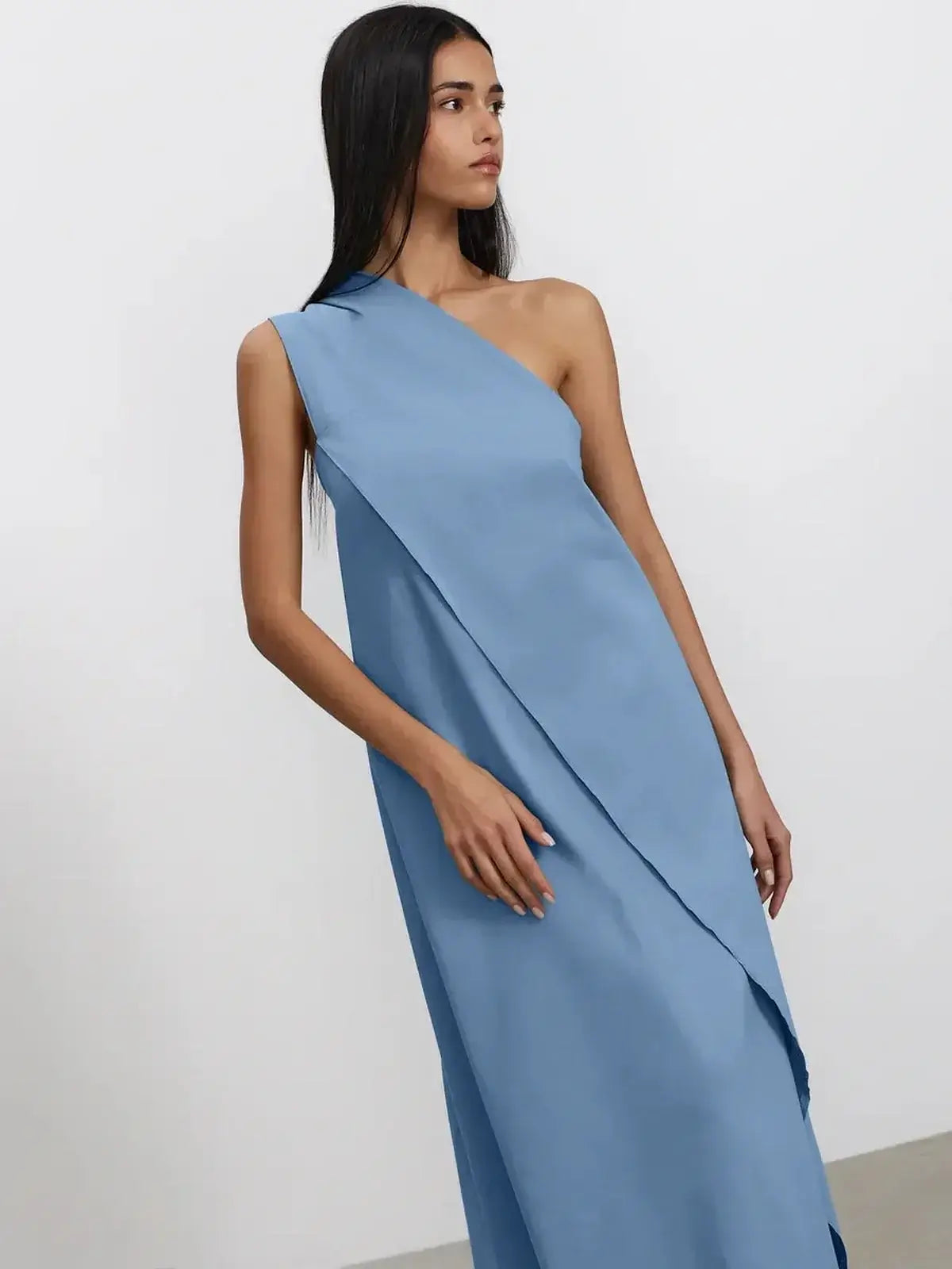 Azure Drape Maxi Dress in blue, featuring an elegant one-shoulder silhouette and a fluid A-line cut.
