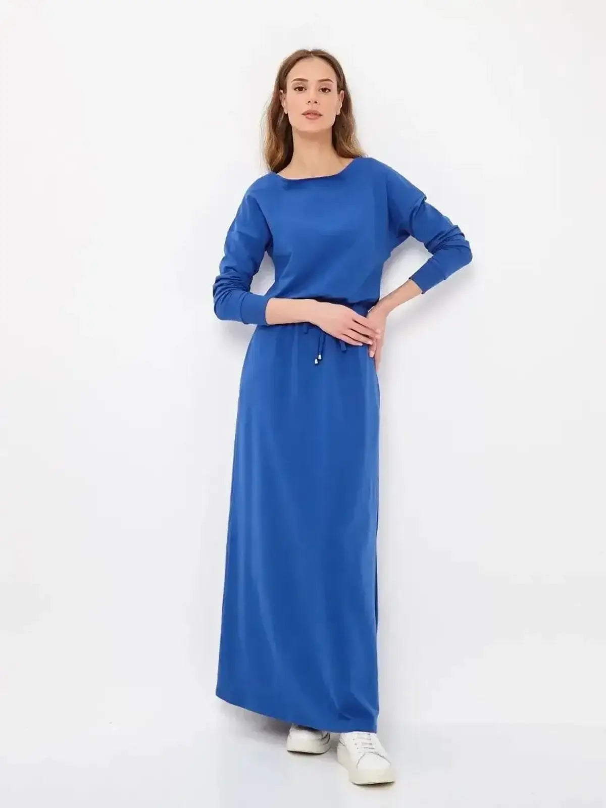 Model wearing the Azure Ease Maxi Dress in cornflower blue, featuring a relaxed fit and drawstring waist.