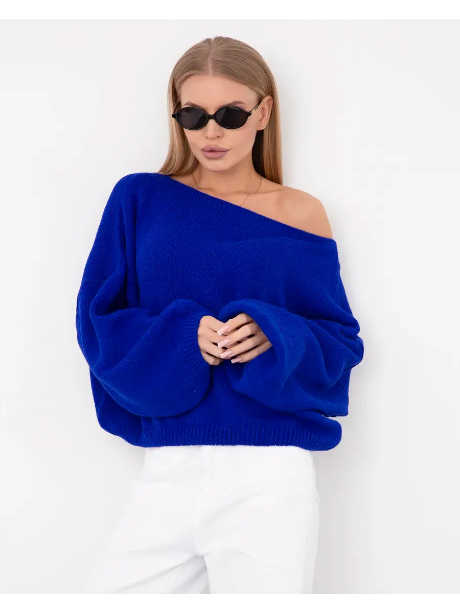 Oversized women in blue Azure Sweater by Lauven, featuring boat neck style and cozy knit design.