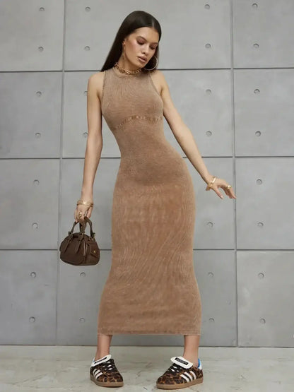 Model showcasing the Bare Curve Maxi Dress in tobacco, featuring sleeveless fit and ribbed texture, perfect for summer styling.