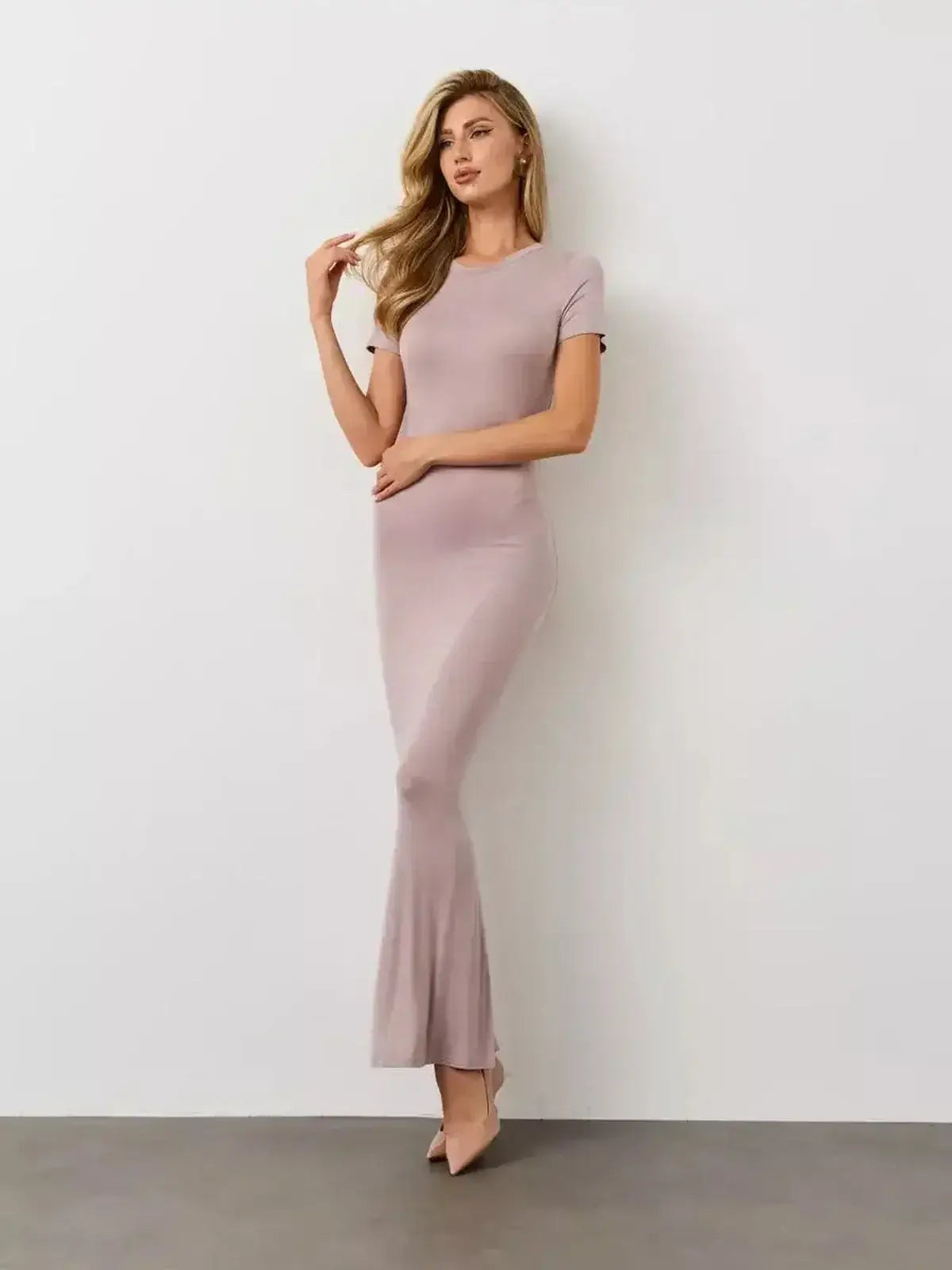 Bare Essence Maxi Dress by Lauven featuring a smooth U-neckline and flared hem for elegant comfort.